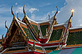 Bangkok Wat Arun - Detail of one secodary entrance gate of the ubosot gallery. 